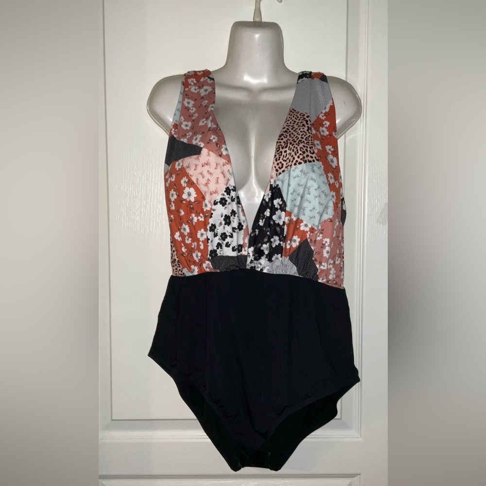 NWOT Swim RX one piece bathing suit with a small pocket.